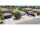 This aerial view captures the neighborhood homes with tidy landscaping and close proximity to each other at 597 S 167Th Dr, Goodyear, AZ 85338