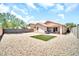 A spacious backyard with a putting green at 597 S 167Th Dr, Goodyear, AZ 85338