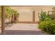 Low maintenance backyard with rock cover, mature plants, and privacy wall at 6730 E Hermosa Vista Dr # 72, Mesa, AZ 85215