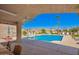 Community pool and spa surrounded by desert landscaping, lounge seating, and a covered gazebo at 6730 E Hermosa Vista Dr # 72, Mesa, AZ 85215