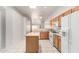Bright kitchen featuring an island, appliances, and a view into the living room at 6730 E Hermosa Vista Dr # 72, Mesa, AZ 85215