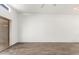 Bright living room with wood floors and large window allowing ample natural light at 6730 E Hermosa Vista Dr # 72, Mesa, AZ 85215