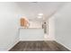 Cozy living room with views of the kitchen and hallway featuring tile flooring at 6730 E Hermosa Vista Dr # 72, Mesa, AZ 85215