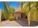 Enclosed patio with desert landscaping and covered area for shaded outdoor living at 6730 E Hermosa Vista Dr # 72, Mesa, AZ 85215