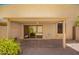 Enclosed patio features desert landscaping and a comfortable, shaded outdoor living space at 6730 E Hermosa Vista Dr # 72, Mesa, AZ 85215