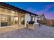 The back patio features a built-in grill and seamless indoor-outdoor flow, perfect for entertaining at 7415 W Lisbon Ln, Peoria, AZ 85381