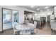 Dining area showcasing seamless flow to the kitchen and outdoor living space at 7415 W Lisbon Ln, Peoria, AZ 85381