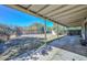 View of the spacious backyard with large covered patio at 829 E Echo Ln, Phoenix, AZ 85020