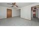 Open living space featuring tile flooring, ceiling fan, and an open layout at 829 E Echo Ln, Phoenix, AZ 85020