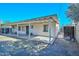 Rear exterior shows large covered patio at 829 E Echo Ln, Phoenix, AZ 85020