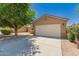 Well-maintained single-Gathering home with a spacious driveway and two-car garage, perfect for suburban living at 8319 E Portobello Ave, Mesa, AZ 85212