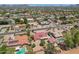 Aerial view of suburban neighborhood with homes with red tile roofs at 8511 W Via Montoya Dr, Peoria, AZ 85383