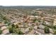Aerial view of suburban neighborhood showing houses and tree-lined streets at 8511 W Via Montoya Dr, Peoria, AZ 85383