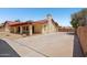 Large driveway and covered patio area offers ample parking at 8511 W Via Montoya Dr, Peoria, AZ 85383