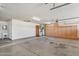 This spacious garage features ample storage with built-in cabinets and a utility sink at 8511 W Via Montoya Dr, Peoria, AZ 85383