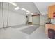 The updated garage offers stylish floors, convenient cabinets, and a service door at 8511 W Via Montoya Dr, Peoria, AZ 85383