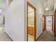 Hallway leading to a bathroom and bedroom at 8511 W Via Montoya Dr, Peoria, AZ 85383