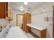 The laundry room boasts a utility sink, white appliances, and ample storage and counter space at 8511 W Via Montoya Dr, Peoria, AZ 85383