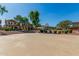 Community basketball court with a lush landscape surrounding it, on a sunny day at 942 S Deerfield Ln, Gilbert, AZ 85296