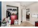 View of a closet and a bedroom with toys and clothes scattered on the floor at 942 S Deerfield Ln, Gilbert, AZ 85296