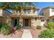 Charming two-story home with a welcoming front porch and drought-tolerant landscaping at 942 S Deerfield Ln, Gilbert, AZ 85296