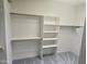 Large walk-in closet with built-in shelving and ample storage space at 955 W Laurel Ave, Gilbert, AZ 85233