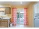 Kitchen featuring sliding glass door with access to the backyard at 10513 W Roundelay Cir, Sun City, AZ 85351