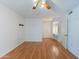 Main bedroom features hardwood floors and vanity area at 10513 W Roundelay Cir, Sun City, AZ 85351