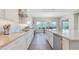 Well-equipped kitchen with sleek countertops, stainless steel appliances, and undermount sink at 10643 E Tumbleweed Ave, Mesa, AZ 85212