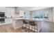 Beautiful kitchen with oversized island and stainless steel appliances, with ample counter seating at 10643 E Tumbleweed Ave, Mesa, AZ 85212