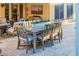 Outdoor dining area with seating for six people on a paved patio at 13716 W Nogales Dr, Sun City West, AZ 85375