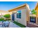 Private backyard space with patio, artificial grass, and secure gated access at 13716 W Nogales Dr, Sun City West, AZ 85375