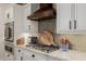 Custom kitchen featuring stainless appliances, stylish backsplash, and light countertops at 13716 W Nogales Dr, Sun City West, AZ 85375
