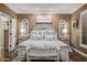 Comfortable main bedroom with beautiful decor, furnishings, and natural light at 13716 W Nogales Dr, Sun City West, AZ 85375