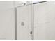 Modern shower featuring white marble tile and a sleek glass door at 15348 W Gray Fox Trl, Surprise, AZ 85387