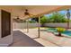 View of the pool from the covered patio, with landscaping at 18207 N 46Th St, Phoenix, AZ 85032