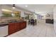 Charming kitchen featuring dark wood cabinets and counters, with an eat-in dining area at 18207 N 46Th St, Phoenix, AZ 85032