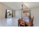 Bright living area with vaulted ceiling, and chandelier lighting, perfect for dining and entertaining at 18207 N 46Th St, Phoenix, AZ 85032