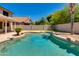 Beautiful backyard pool with a stone accent, clear blue water, and a relaxing, private atmosphere at 18207 N 46Th St, Phoenix, AZ 85032