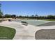 Community basketball court offers a recreational area for residents, complete with benches and landscaping at 18871 S 209Th Way, Queen Creek, AZ 85142