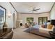 Comfortable main bedroom with fireplace and pool view at 1905 N Calle Maderas --, Mesa, AZ 85213