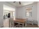 Cozy dining room with natural light and direct access to the living space at 19771 W Woodlands Ave, Buckeye, AZ 85326