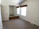 Comfortable bedroom offering a closet with mirrored doors and modern flooring at 2206 S Ellsworth Rd # 1736, Mesa, AZ 85209