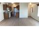 Open kitchen leading into living area, featuring ample counter space and appliances at 2206 S Ellsworth Rd # 1736, Mesa, AZ 85209