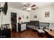 room with ceiling fan, crib, closet, dresser and toy chest offers ample space for rest and play at 22610 W Mohave St, Buckeye, AZ 85326