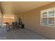 The covered patio offers a comfortable space for outdoor seating and relaxation at 22610 W Mohave St, Buckeye, AZ 85326