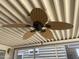 This ceiling fan is stylish, featuring woven blades and a black fixture at 2290 S Seminole Dr, Apache Junction, AZ 85119
