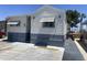Charming manufactured home with blue and white siding and awning-shaded windows at 2290 S Seminole Dr, Apache Junction, AZ 85119