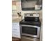 Close-up of the stainless steel oven and granite countertops in the kitchen at 2290 S Seminole Dr, Apache Junction, AZ 85119