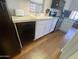 Bright kitchen featuring white cabinets, granite countertops, and modern appliances, ready for cooking at 2290 S Seminole Dr, Apache Junction, AZ 85119